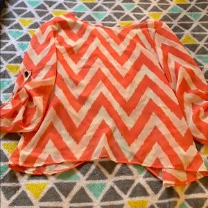 Chevron shirt with slit in back size S